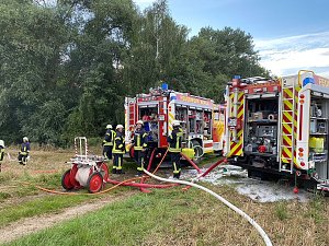 M&auml;hdrescher in Flammen 
